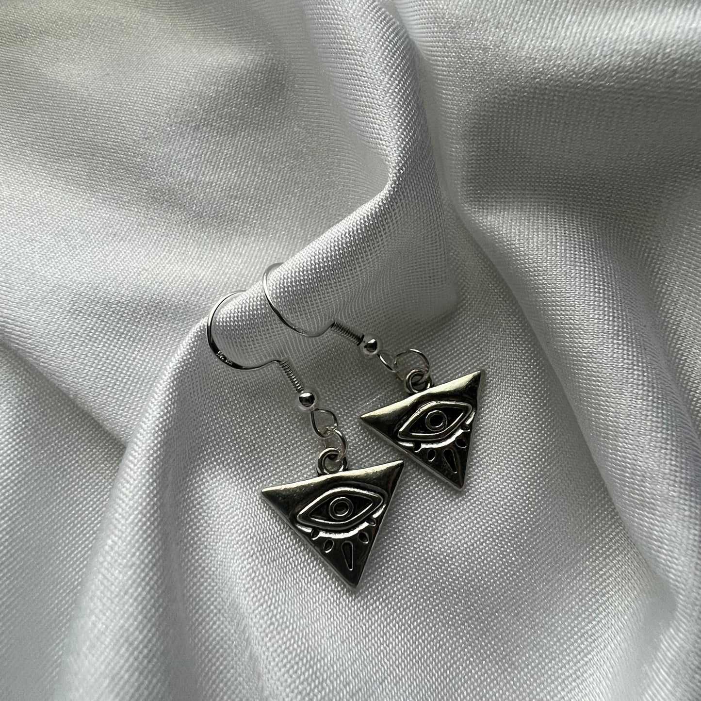 triangle eye earrings