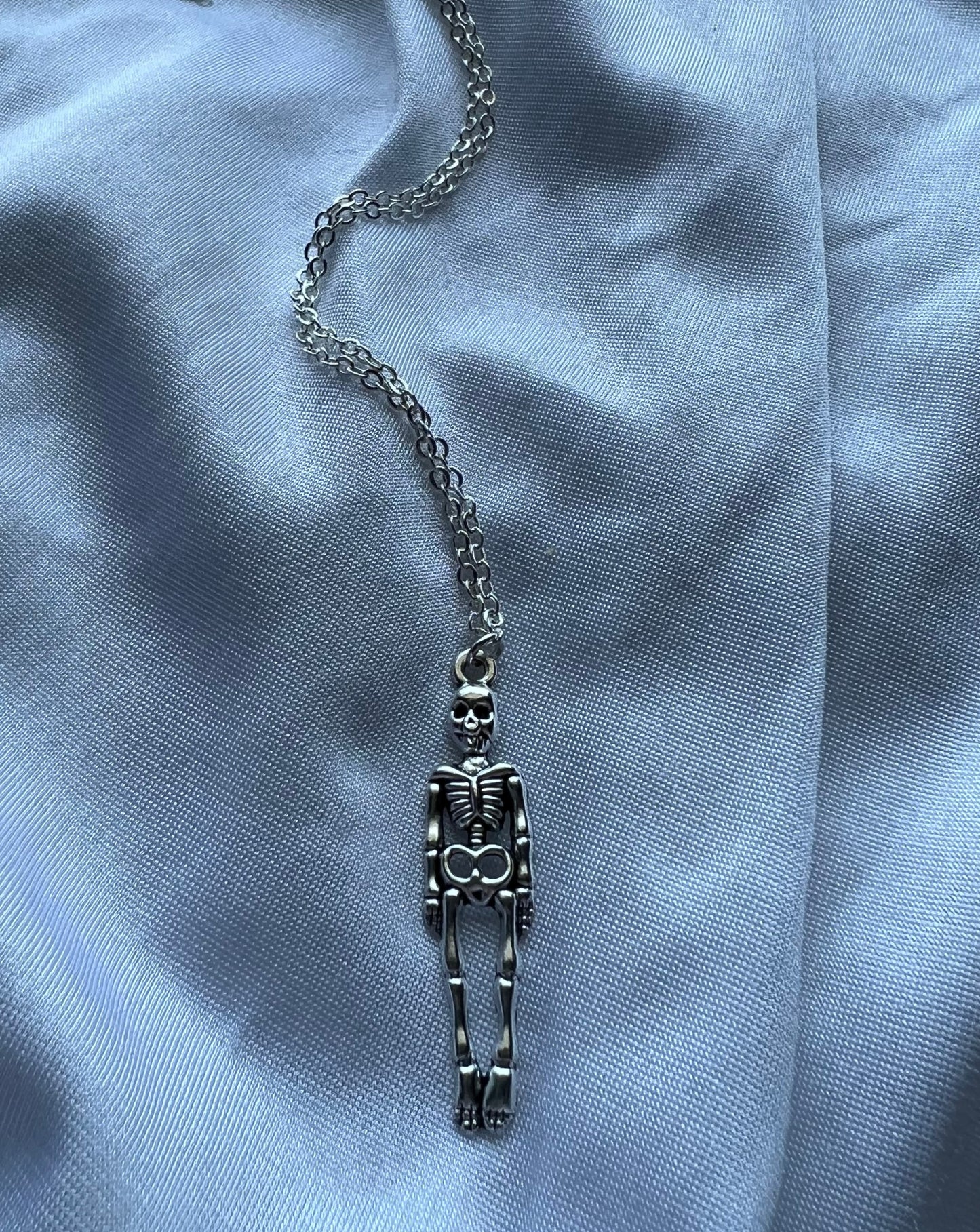 standing skeleton necklace