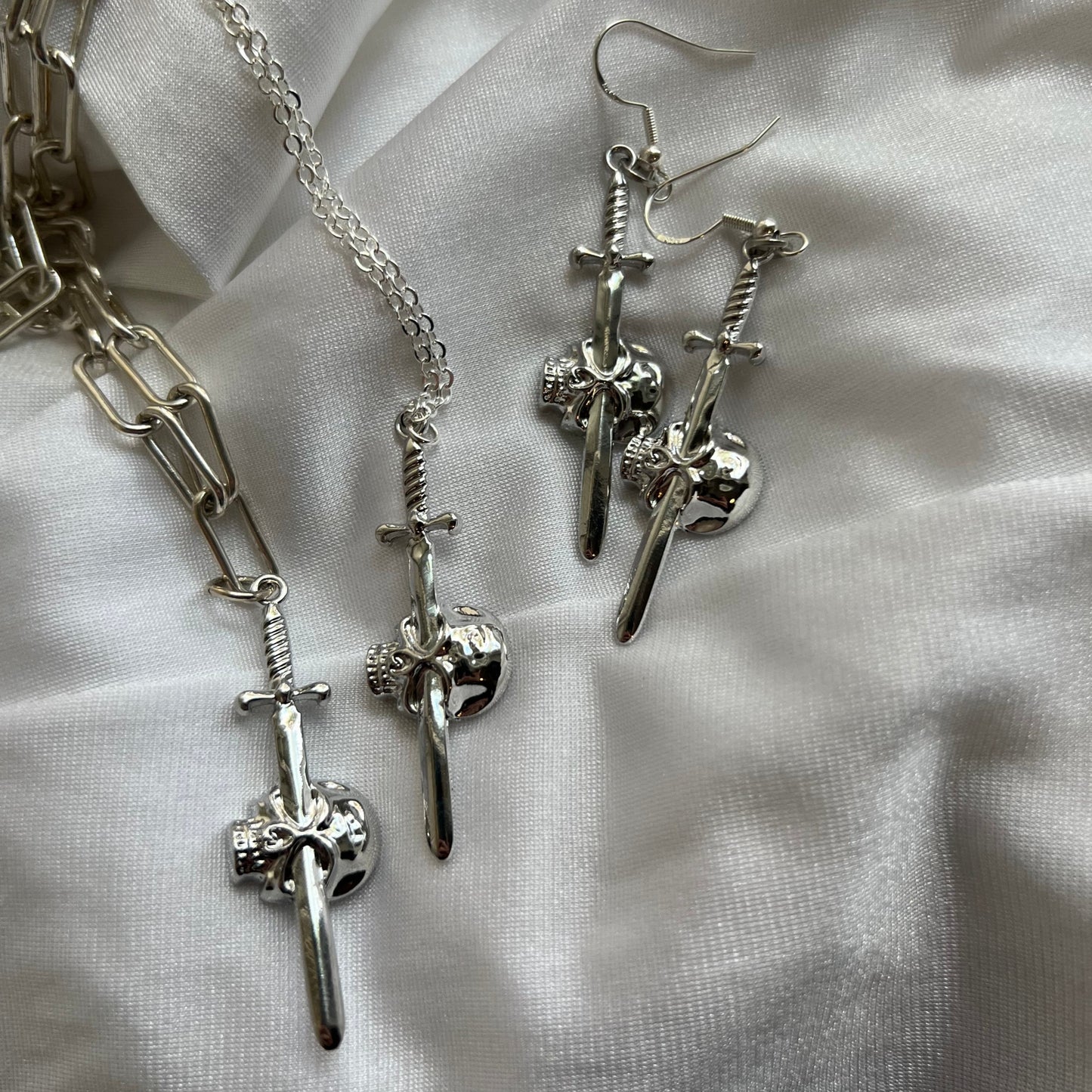 new skull sword necklace