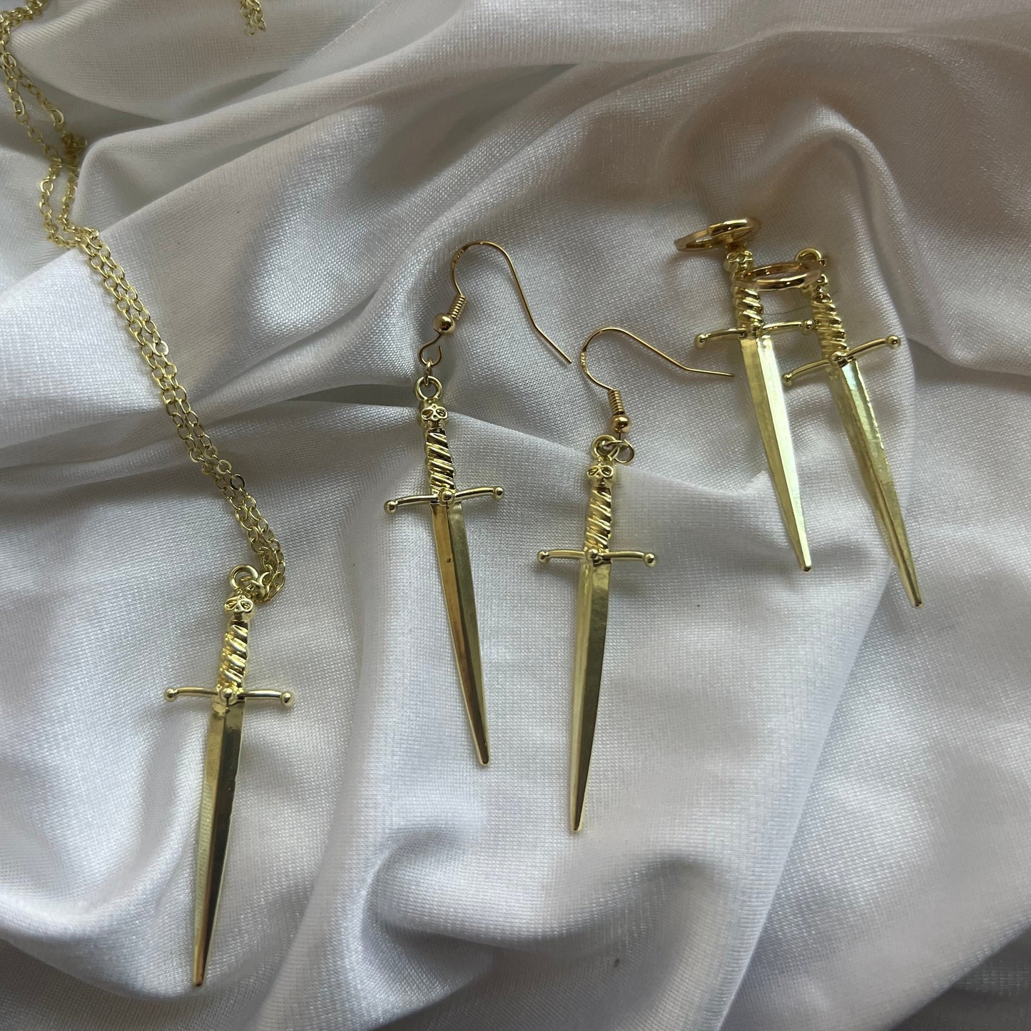 new gold sword necklace