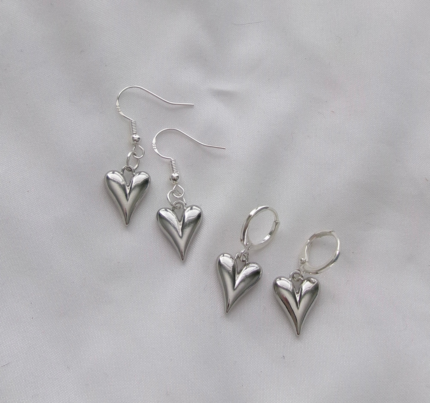 new silver metal bow earrings