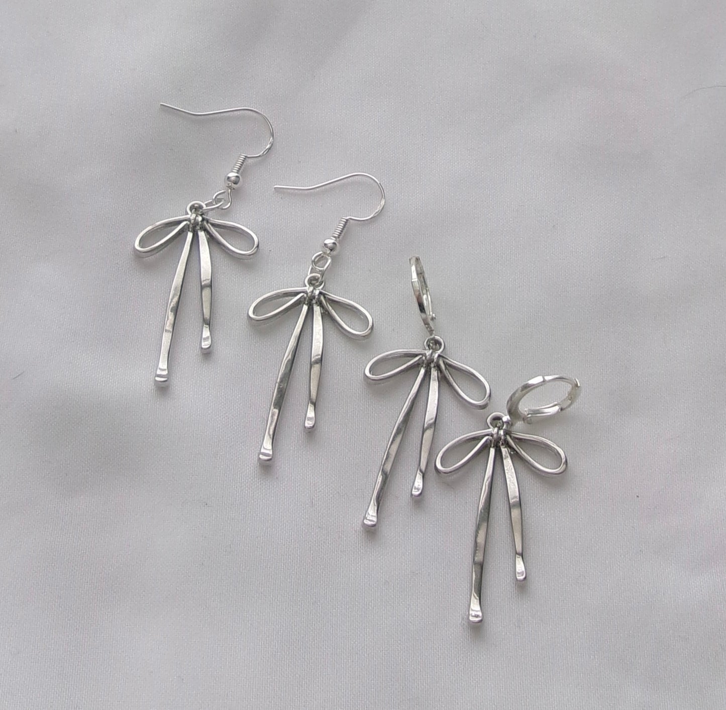 new silver bow earrings