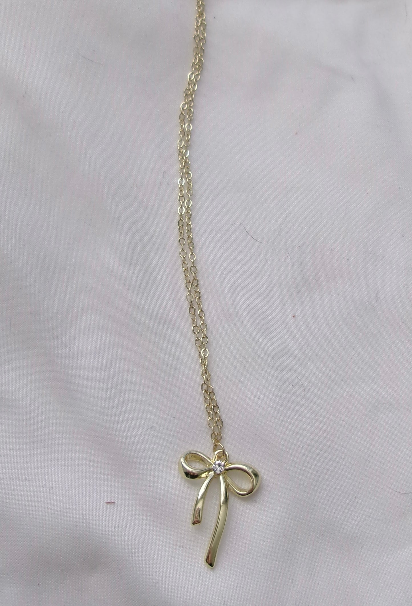new gold diamond bow necklace