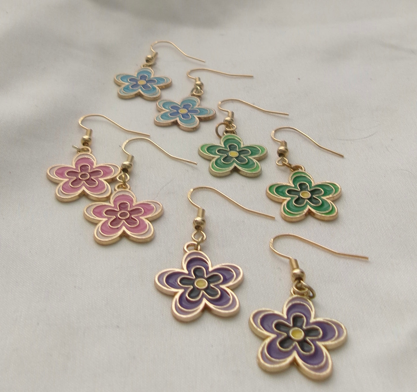 new gold groovy flower earrings