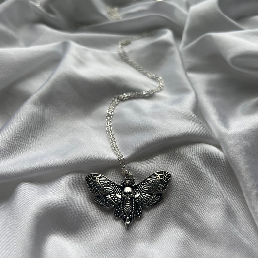 skeleton moth necklace