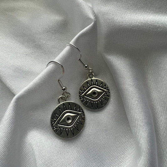 circular eye earrings