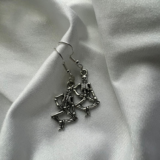 dancing skeleton earrings