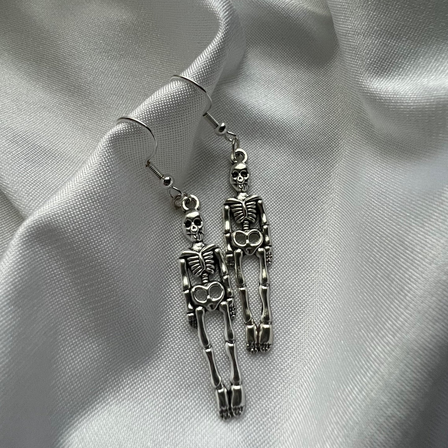 standing skeleton earrings