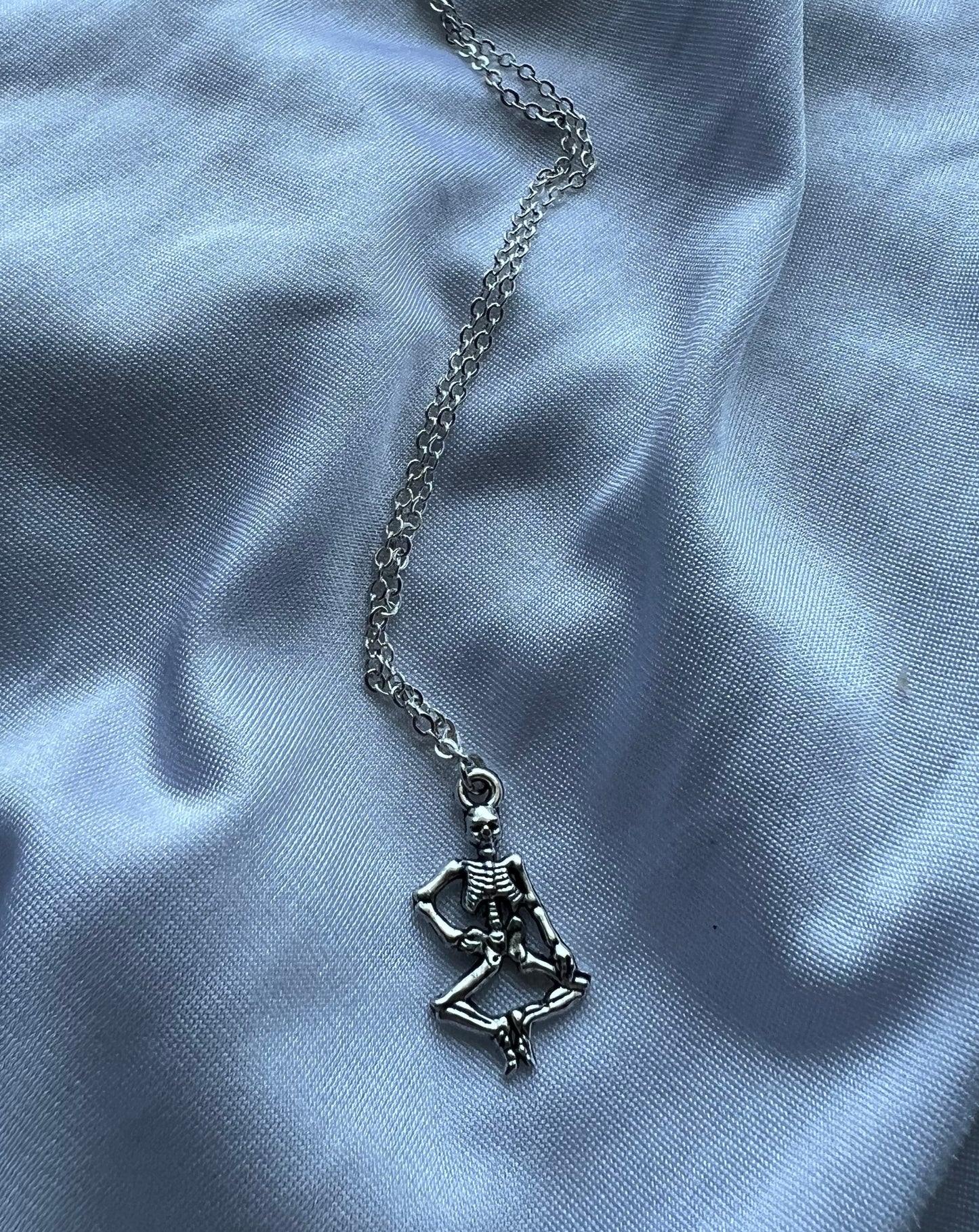 dancing skeleton necklace