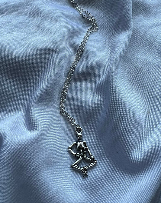 dancing skeleton necklace
