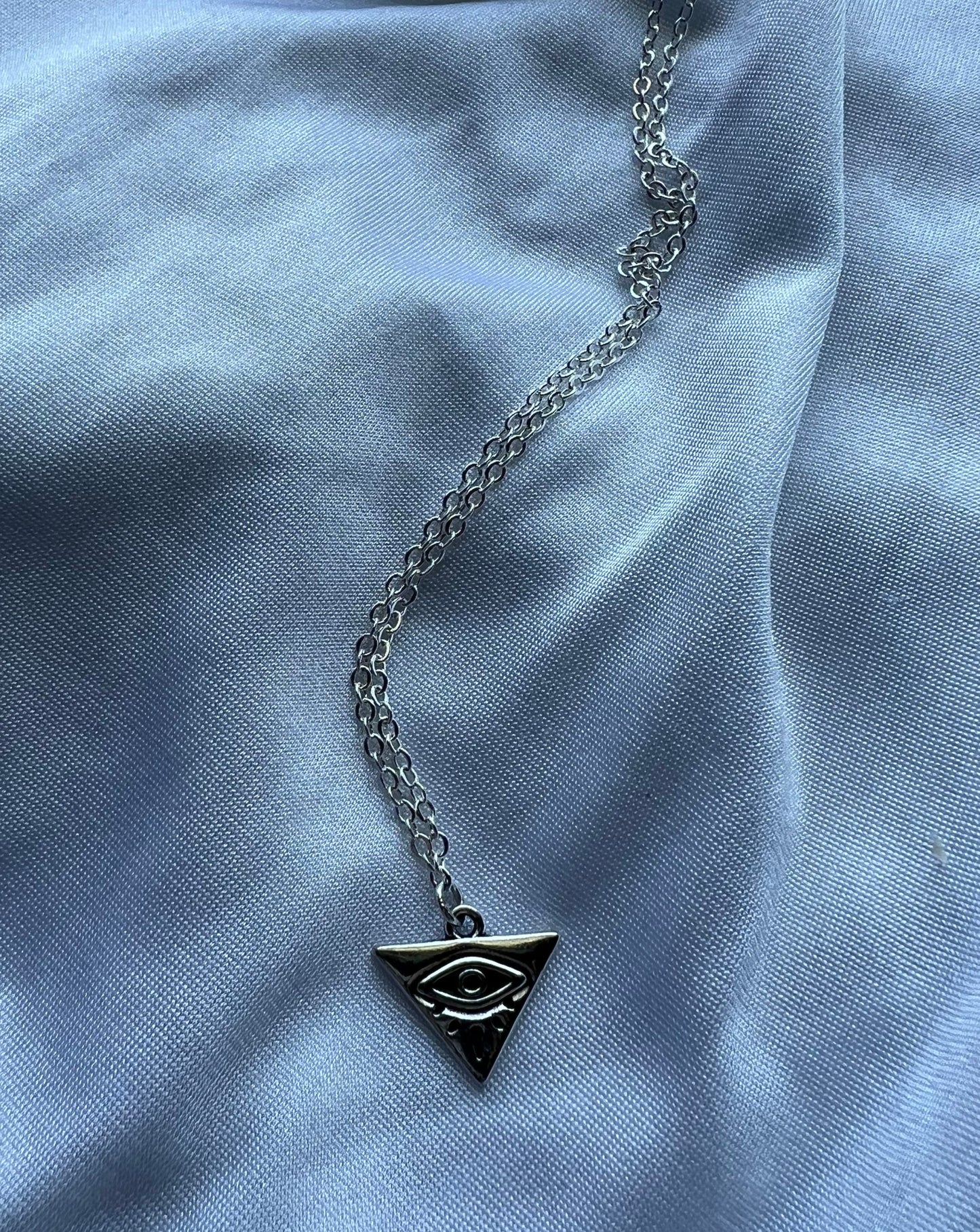 triangle eye necklace
