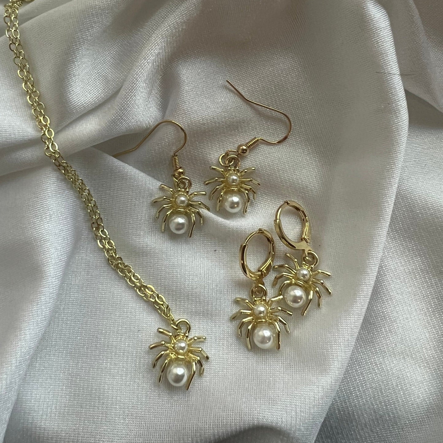 new gold pearl spider earrings
