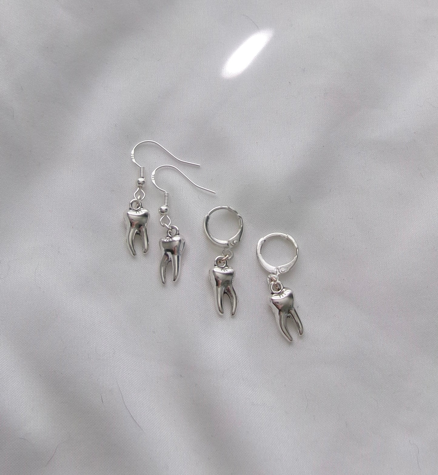 new tooth earrings
