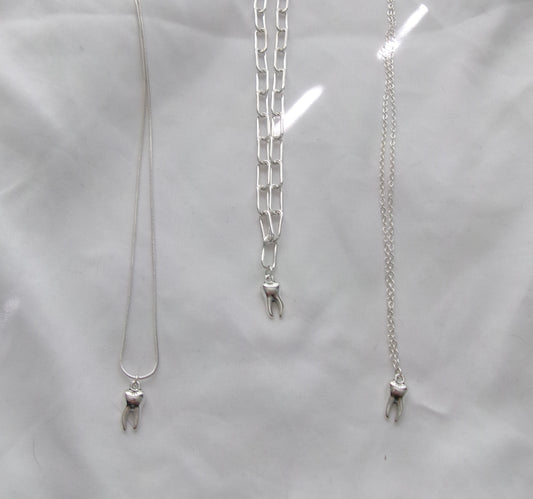 new tooth necklace