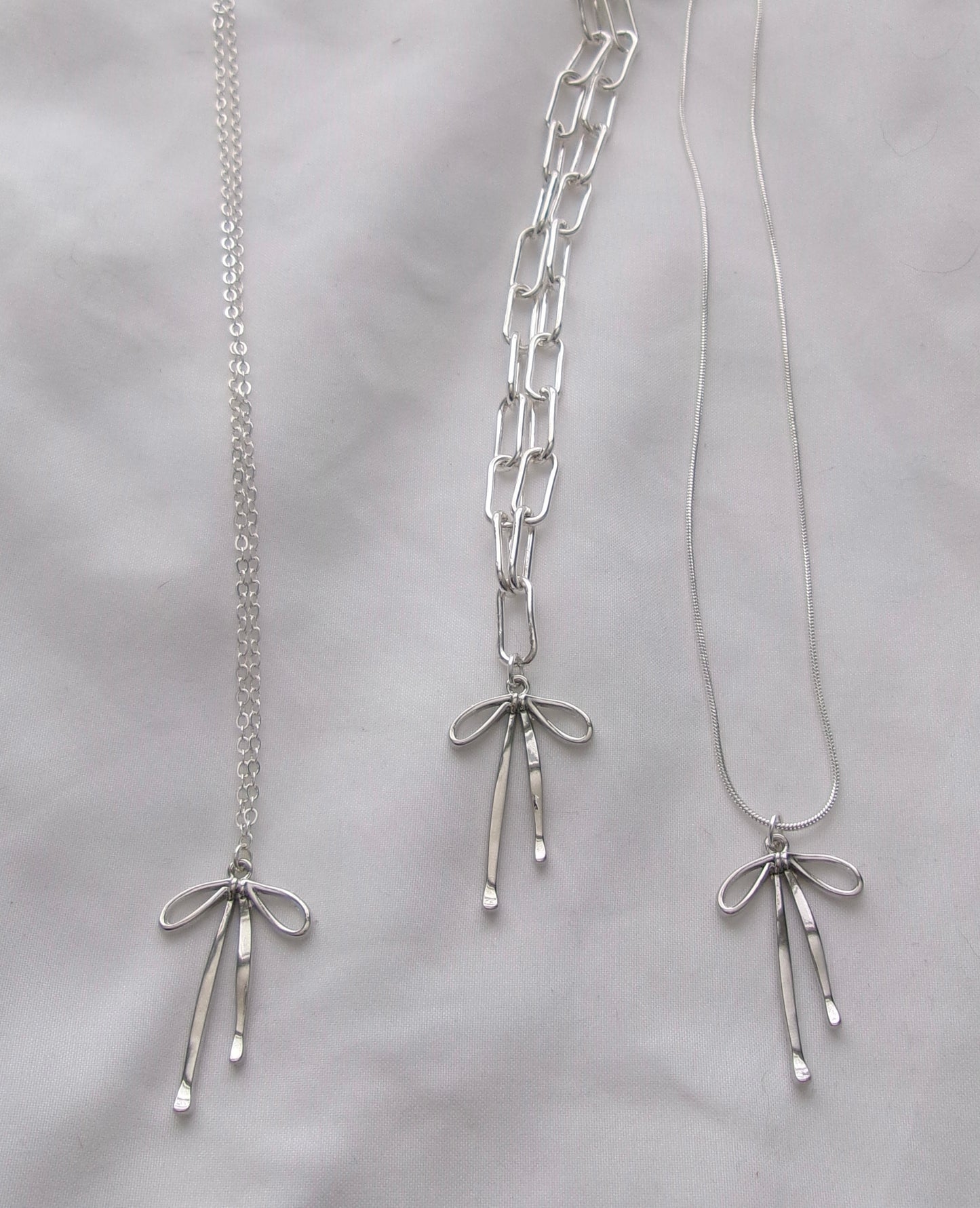 new silver bow necklace