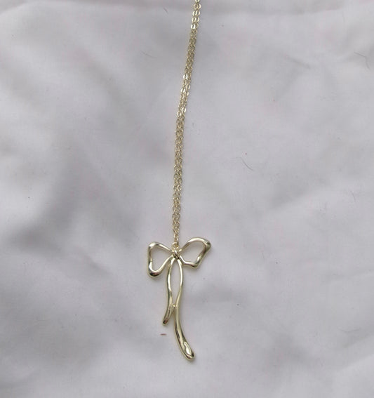 new gold long bow necklace